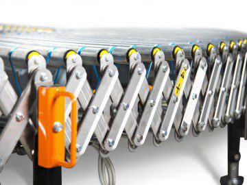 Cinta transportadora OCM de rodillos extensible y flexible con estructura de tijera metálica